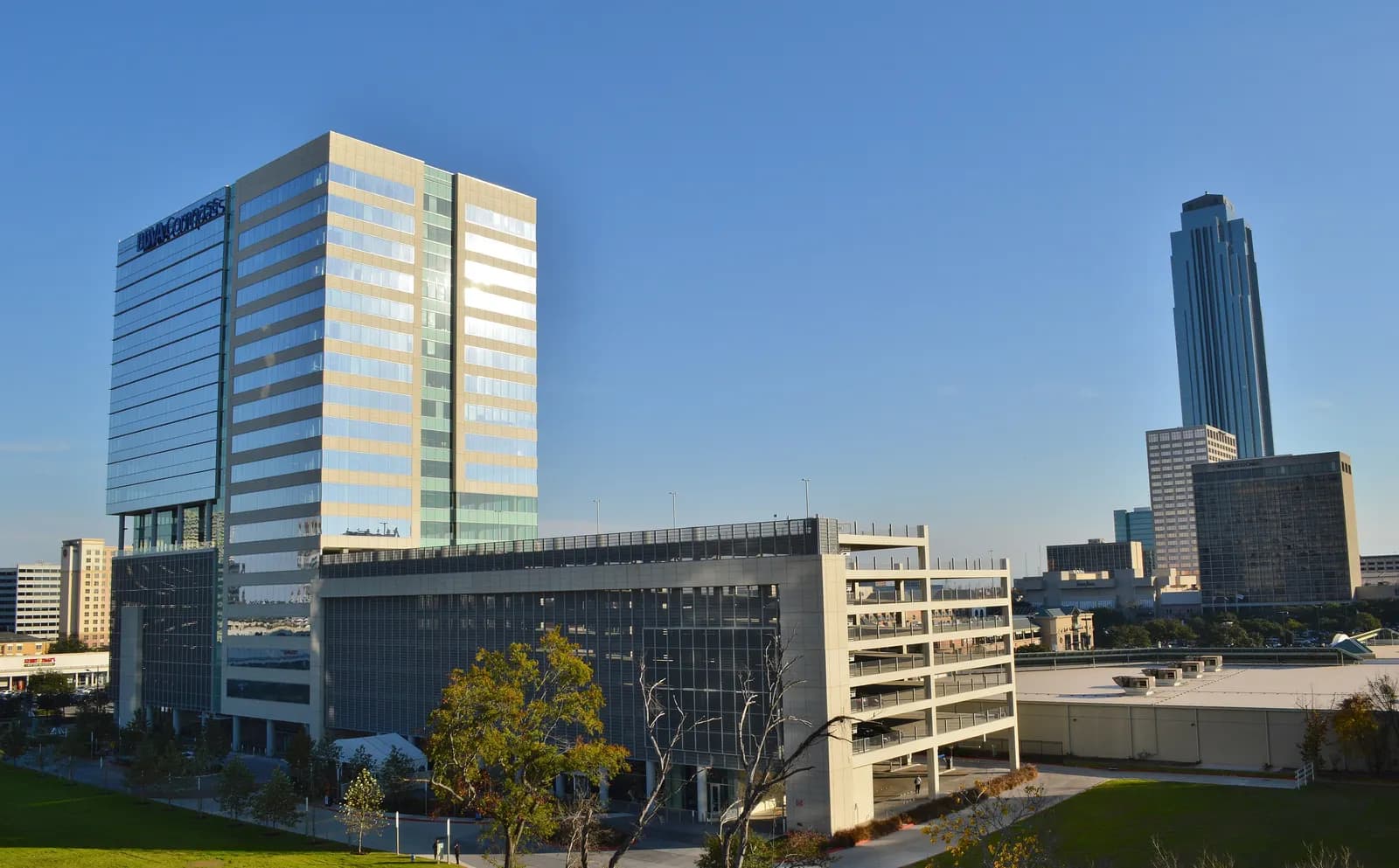 Office towers and a multi-storey car park in Houston's Uptown District, with Williams Tower rising on the right