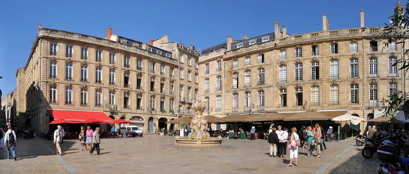 The Place du Parlement in the Saint-Pierre quarter of Bordeaux, a pedestrian square of 18th century stone houses with restaurant terraces around a fountain