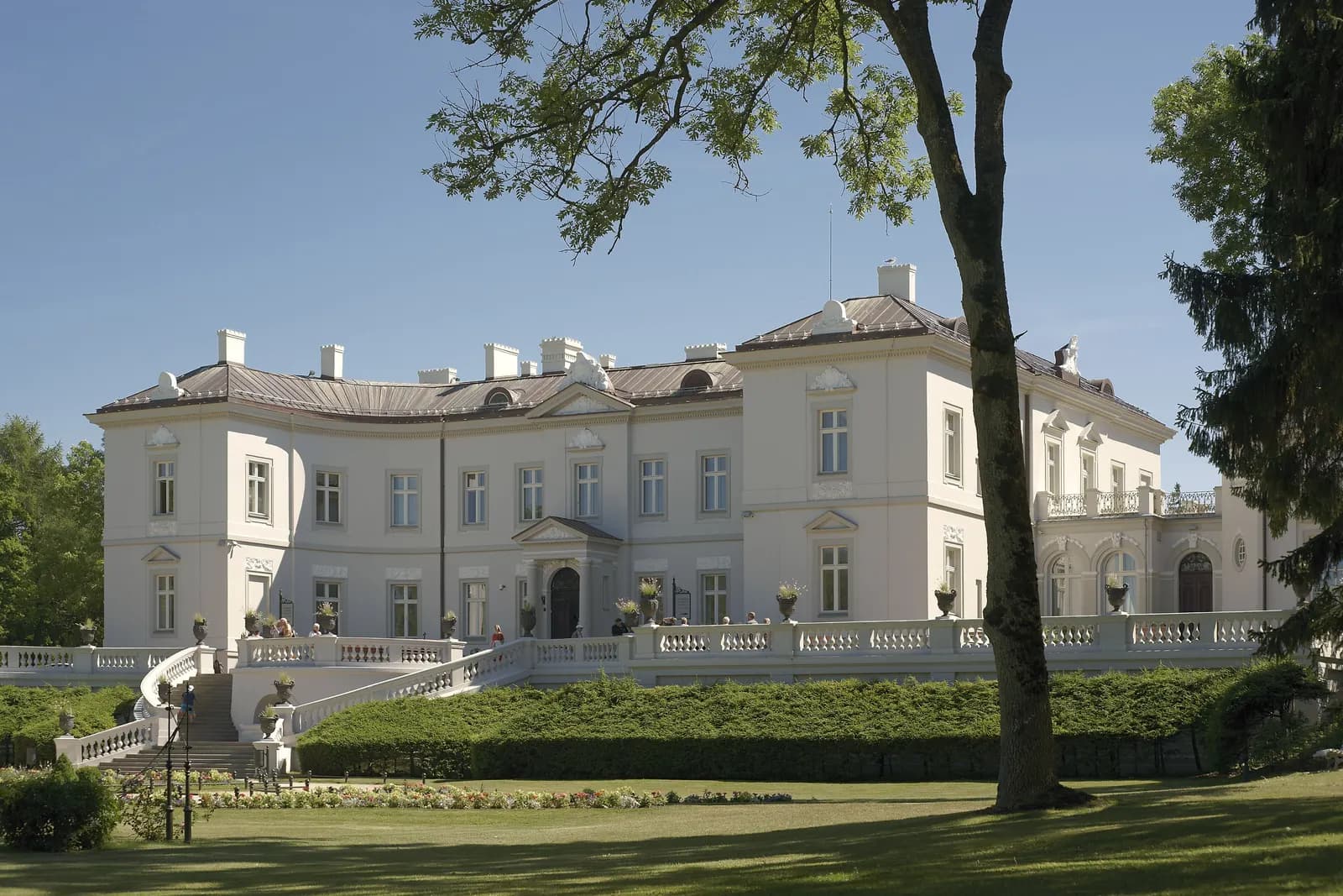 The white Tiškevičiai Palace, home of the Palanga Amber Museum, above the lawns of Birutė Park