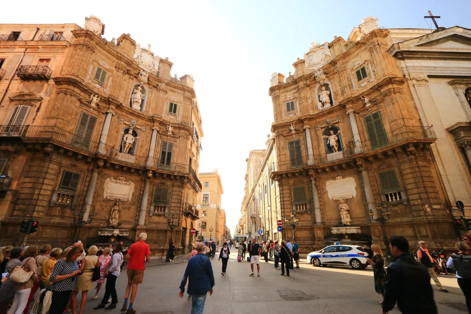 The Quattro Canti crossroads in Palermo, two curved baroque facades with statues in niches facing each other across the street